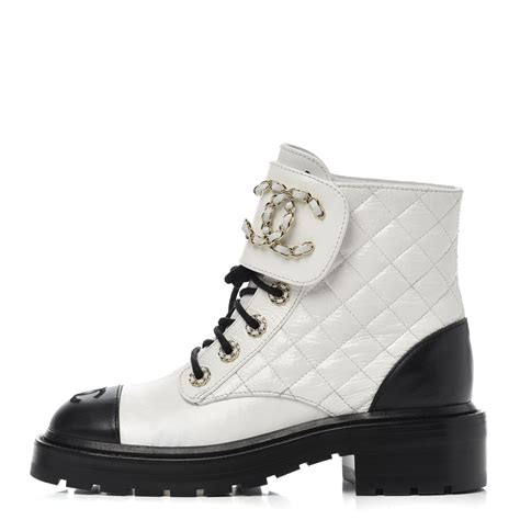 chanel lace ups boots.